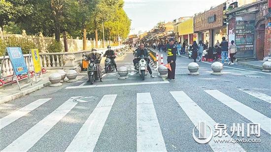 老城區(qū)4路口設(shè)非機動車待行區(qū) 根據(jù)路口機動車信號燈通行